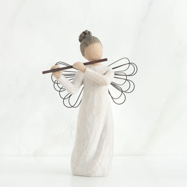 Willow Tree® Faceless angel figurine wearing white dress and black wire wings playing black flute