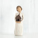 Willow Tree® Faceless girl figurine facing forward wearing white dress, holding brown house figurine in her arms