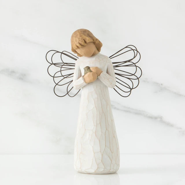 Willow Tree® Small girl figurine with blonde hair wearing white dress and holding light grey animal - she has black wire wings