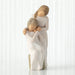 Willow Tree® Front view, seated older female in cream dress, with younger female in cream dress, standing at her shoulder, hands embracing