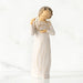 Willow Tree® Front view, standing female figure in cream dress, holding gold wire circle in which is written 'love you'