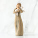 Willow Tree® Faceless woman figurine standing wearing light tan dress holding white lamb in her arms