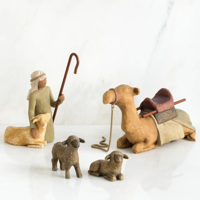 Willow Tree® Set of figurines - golden camel laying down surrounded by two grey sheep and wiseman petting golden lamb