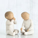 Willow Tree® Set of two faceless little children figurines - sitting down, wearing all white