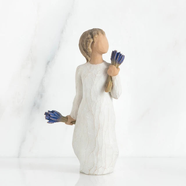 Willow Tree® Small girl figurine wearing white dress holding two blue flower bouquets in each hand