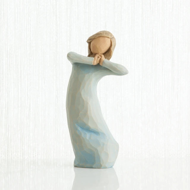 Willow Tree® Small brown hair girl figurine wearing light blue dress and hands up to her face