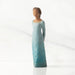 Willow Tree® Front/left view: Darker-skin figure, arms clasped behind back, hair and deep blue ombré garment dotted with gold leaf