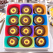 Hand-Decorated Sunflower OREO Cookies — Box of 24 in a candy kitchen setting