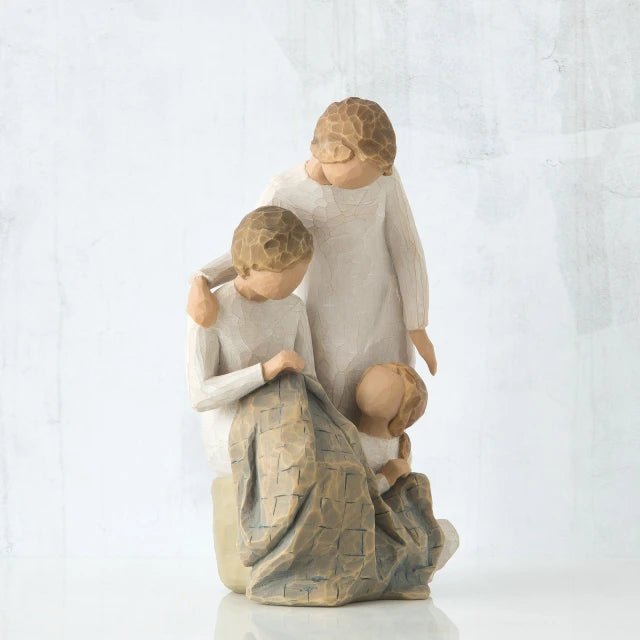 Willow Tree® Brother and sister figurine sitting around small sister figurine - all faceless, wearing white