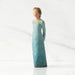 Willow Tree® Front/left view: Lighter-skin figure, arms clasped behind back, hair and deep blue ombré garment dotted with gold leaf