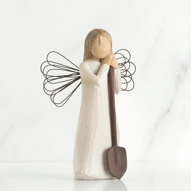 Willow Tree® Young faceless girl figurine in white dress with black wire wings holding brown shovel