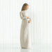 Willow Tree® Faceless pregnant woman figurine wearing white dress with hands clutching her stomach