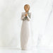 Willow Tree® Faceless woman figurine standing facing forward wearing white dress holding star print napkin