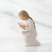 Willow Tree® Side view of kneeling female figure in cream dress, with wire butterfly on extended hands, on marble background