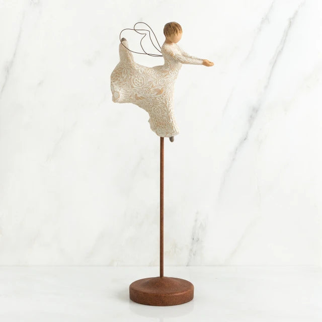 Willow Tree® Faceless angel figurine wearing all white dress dancing on wooden pedestal stand