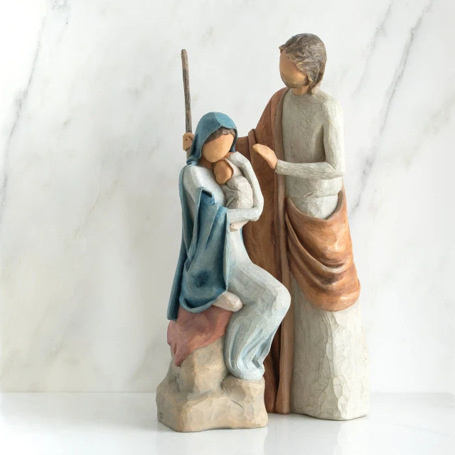 Willow Tree® Nativity scene figurines - mother in blue holding child with father standing over them