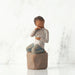 Willow Tree® Front view: Figure of darker-skin child, kneeling on rock, holding wire circle with ‘love you’ written in wire