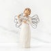 Willow Tree® Front view of angel with tied back brown hair, holding up a circular wire sign that says 